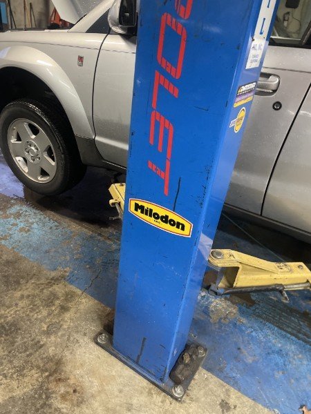 Vehicle on the lift for service.